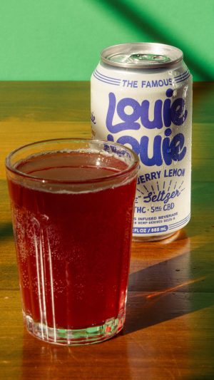 Louie Louie Blackberry Lemon can on a table